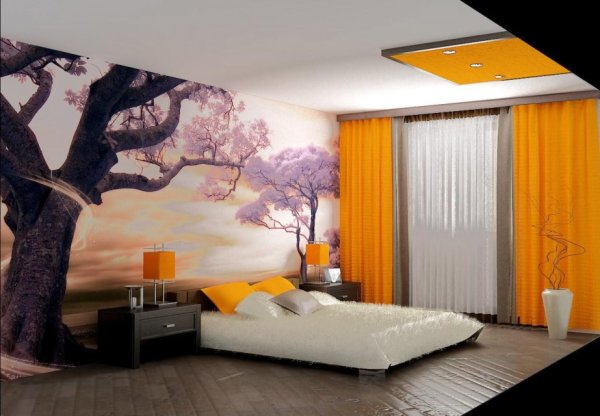 Mural dinding di kamar tidur di atas tempat tidur, dengan gambar sakura yang mekar melawan matahari terbenam, di bahagian dalam bilik tidur